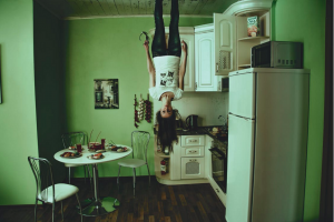 horror, speculative fiction, woman standing on ceiling and world reversed